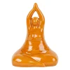 Décoration femme yoga en grès moutarde h21cm